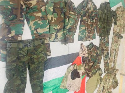 אקדח, מדים צבאיים ודגלי פלסטין נמצאו ברשותו של תושב האזור